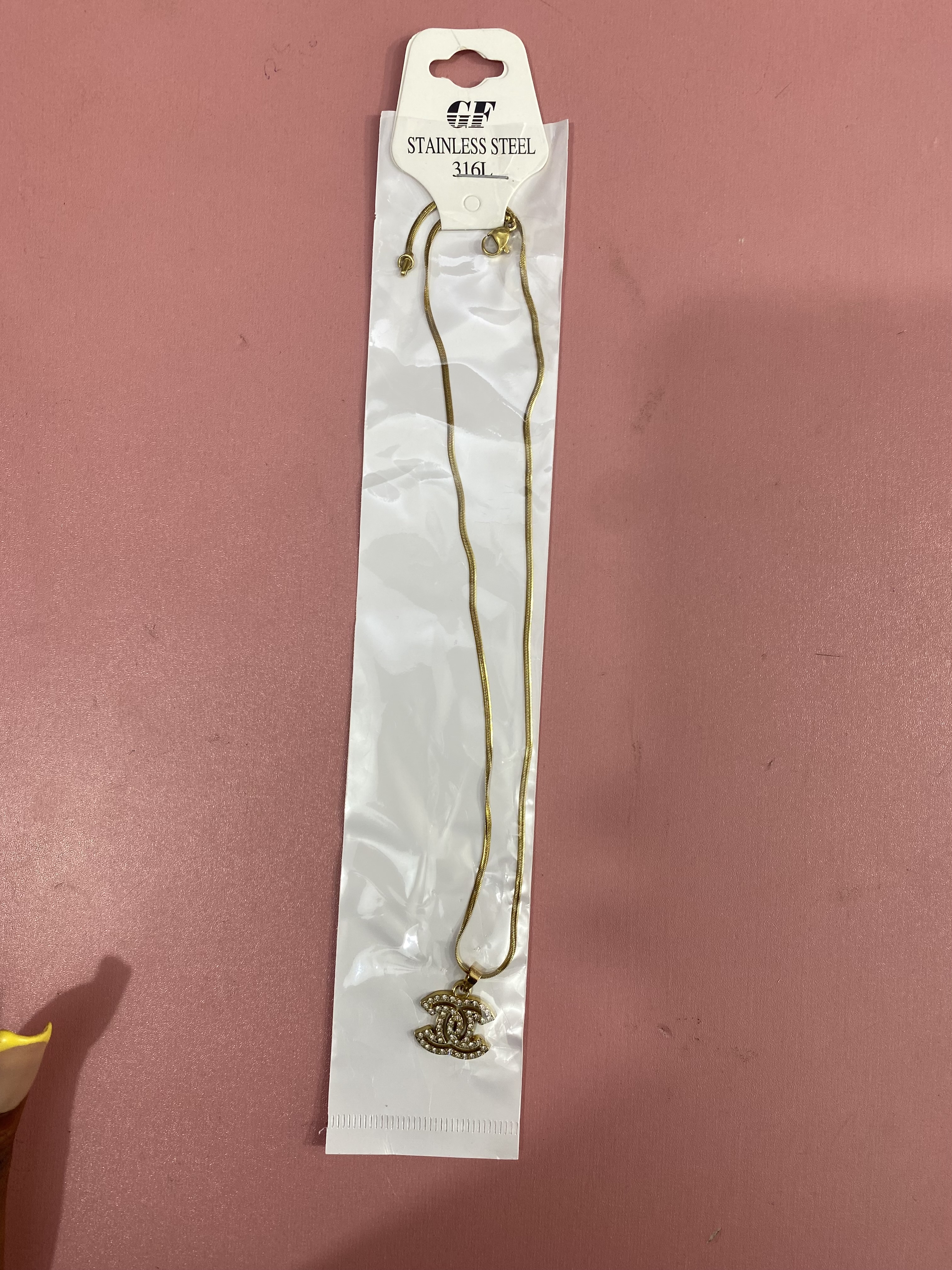 Channel designer necklace